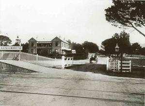 The railway crossing at Kenilworth Station, now Kenilworth Road. (c. early 20th Century: J 9763 Cape Archives)